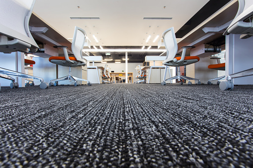 Clean carpet in a modern open-plan office after commercial carpet cleaning